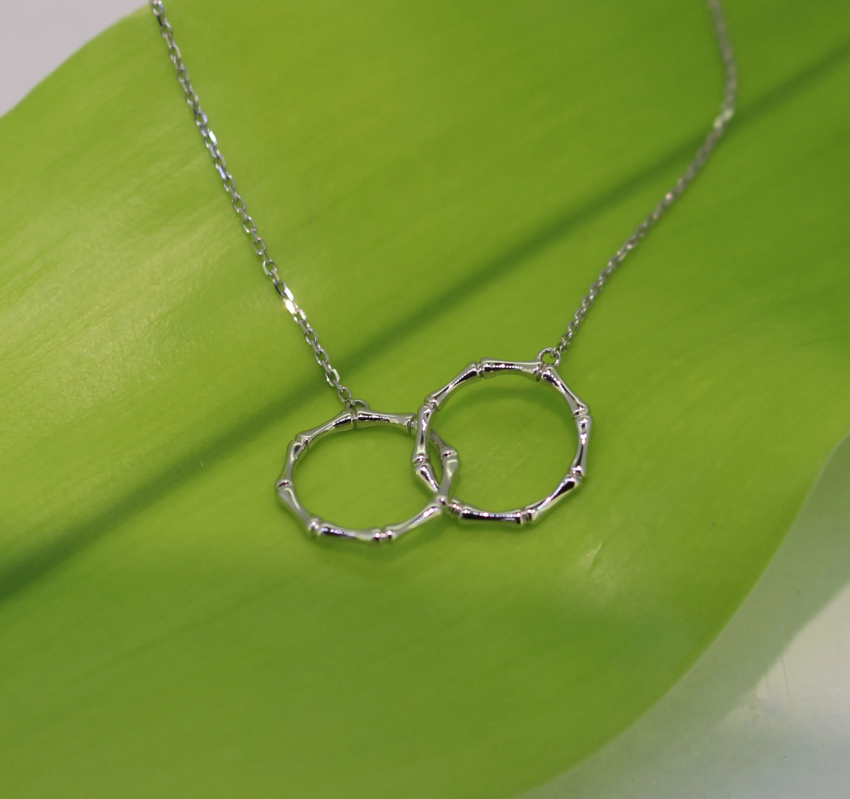 Silver Intertwined Bamboo Hoop Infinity Necklace